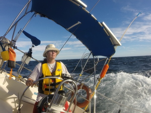 Barb at helm in boisterous sail to Isla Esteban