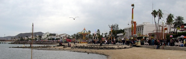 View of Parade and Midway rides from the beach