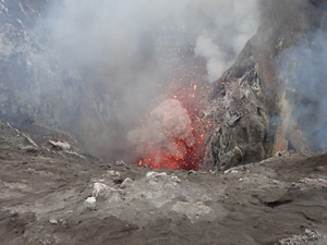 An eruption with ejected lava and gases