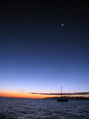Moon and Venus close to conjunction with Konami sailing